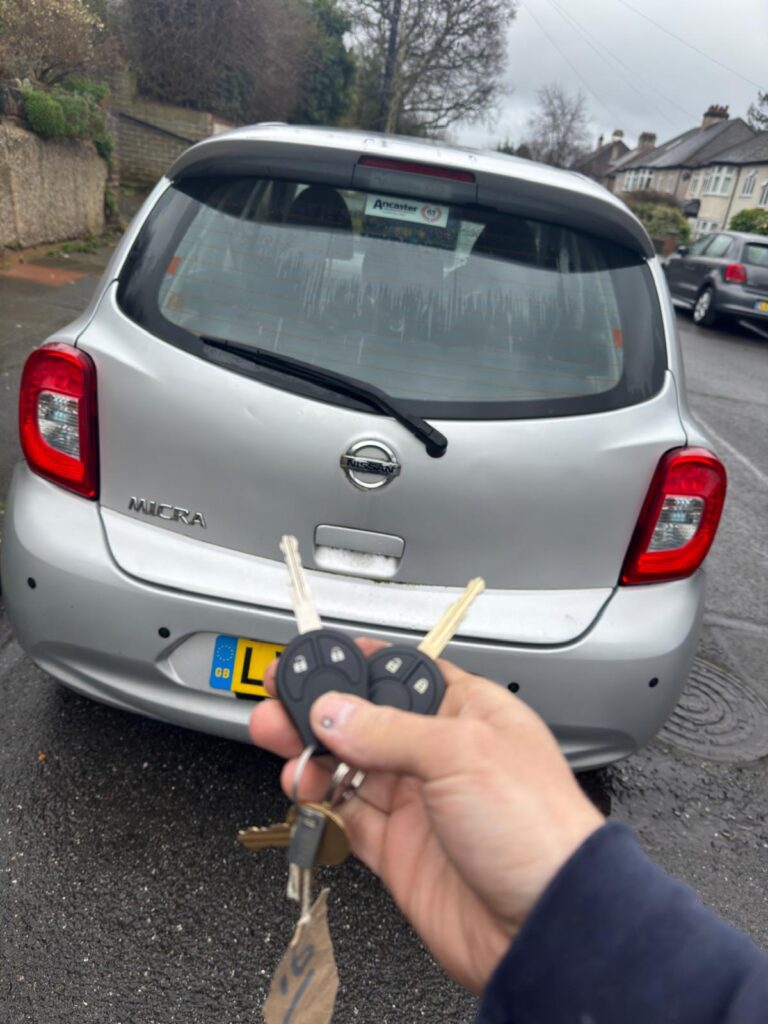 Royale Car Keys technician programming a spare key for a Nissan on the A205 near Eltham High Street